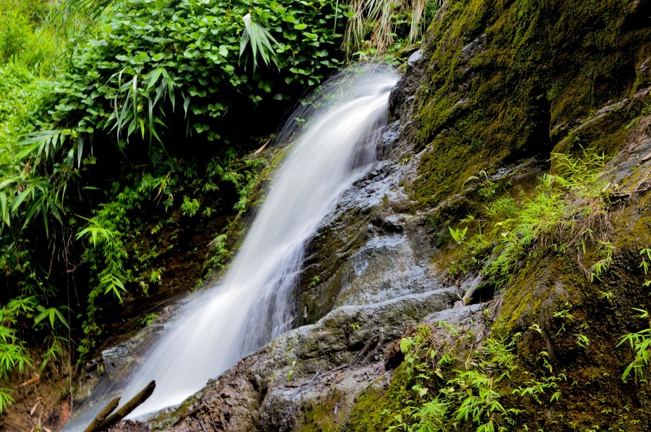 Discover the serene beauty of Himchari Fountain, located just 12 km from Cox's Bazar. Enjoy stunning views, tranquil beaches, and lush green hills, perfect for nature lovers and adventure seekers alike.